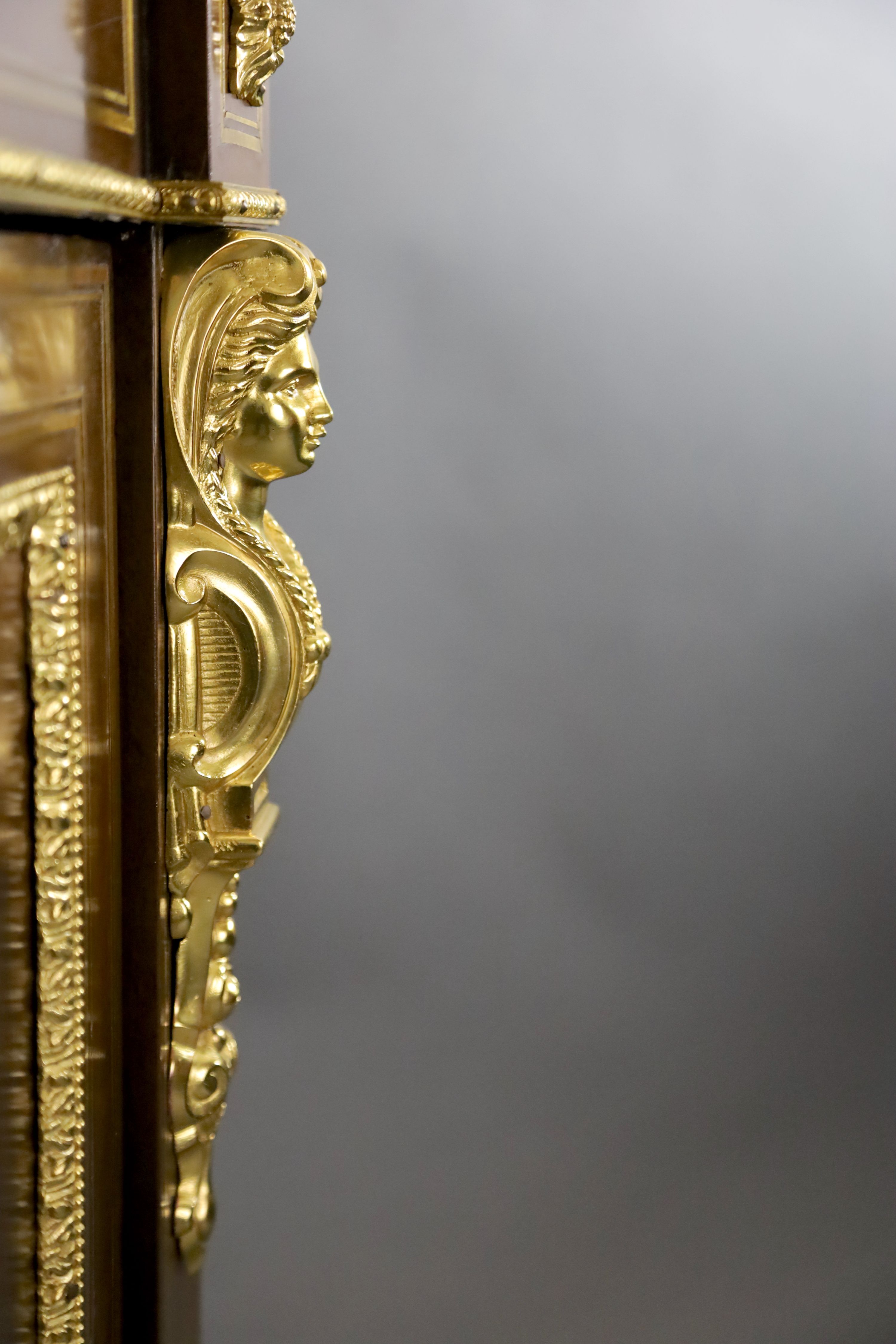 A pair of 19th century French ormolu mounted walnut pier cabinets, W.2ft 11in. D.1ft 4in. H.3ft 7in.
